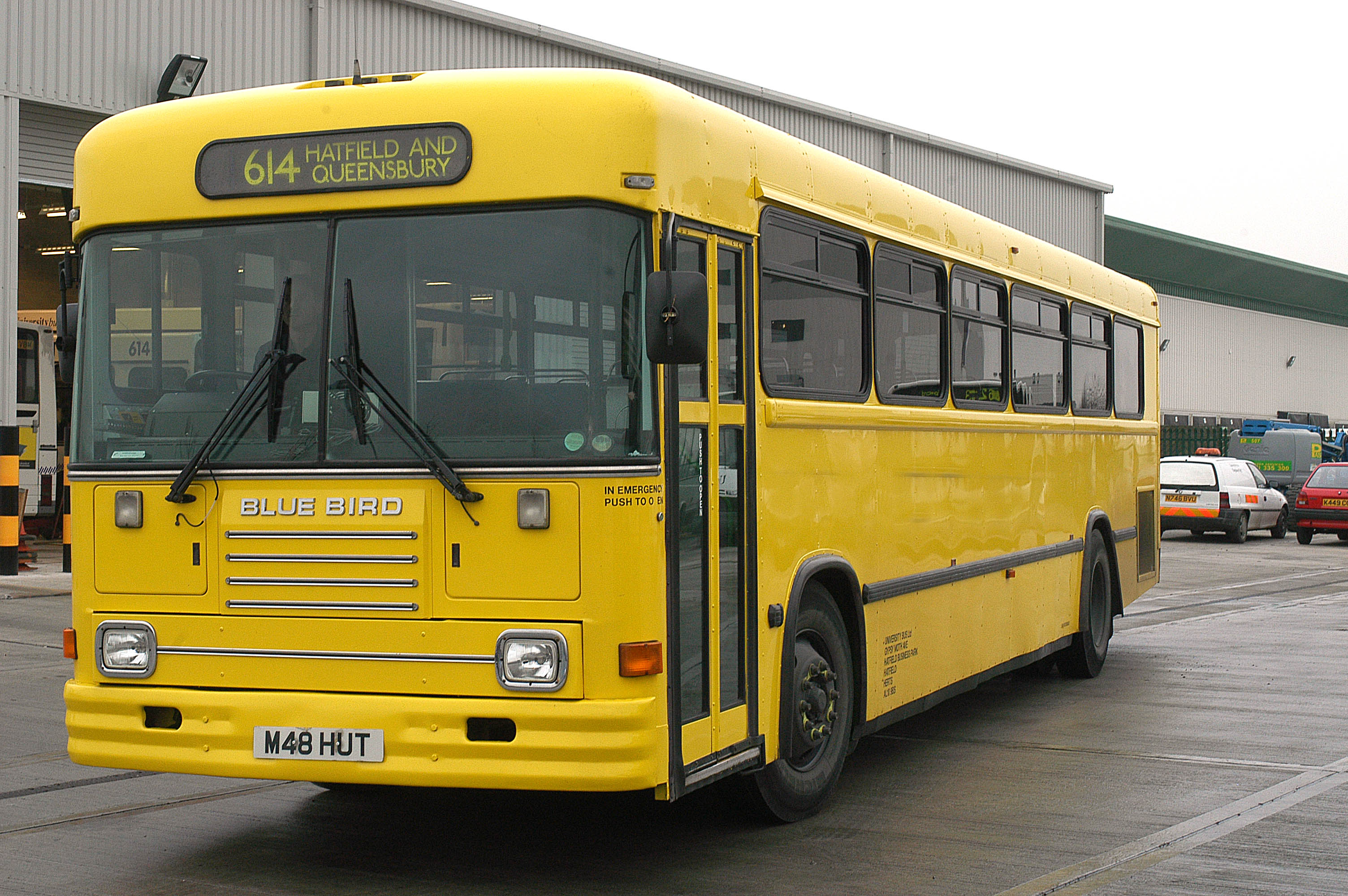 photo of an Uno Blue Bird All American school bus